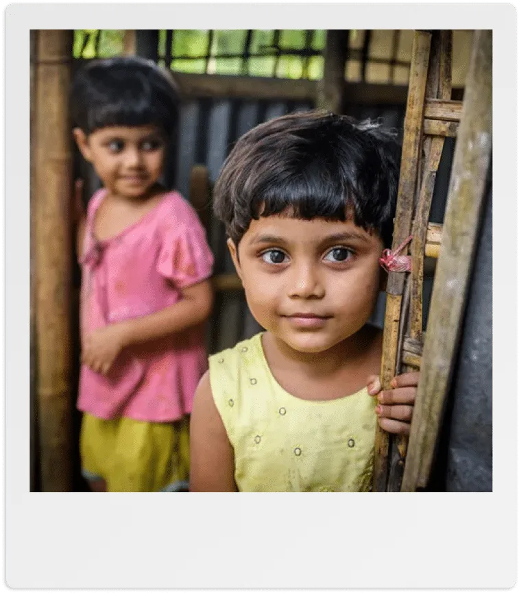 Foto di Marua, una giovane ragazza con capelli scuri corti, sorridente. Evidenzia l'impatto dei progetti di World Vision sulle comunità in Asia